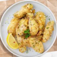 Garlic Parmesan Wings · Classic bone-in or boneless wings oven-baked, cooked to order perfectly crisp, tossed in our...