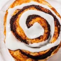 Vanilla Cinnamon Roll · A large, gourmet cinnamon roll made with moist buttery dough and packed with rich, imported ...