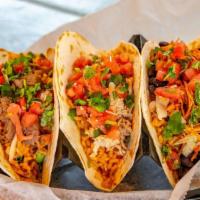 Basket Of Tacos · Start with your choice of a flour or corn tortillas, meat choice and your favorite freebies ...