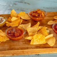 Chips & Salsa · House made tortilla chips and your choice of salsa to round off any entrée!