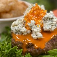 Buffaloed Bison · Fresh Ground Bison Burger Topped with Blue Cheese, Buffalo Sauce, Lettuce, Tomato & Onions.