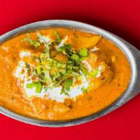Butter Chicken · Boneless chicken cooked with tomato sauce.