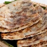 Keema Naan · Multi-layered unleavened white bread stuffed with minced lamb and spices.