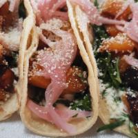 Butternut Tacos (3) · Grilled butternut, cotija cheese, aioli, pickled onions, kale on street-style, corn tortilla...