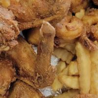 Chicken Wings & Fries · Golden fried chicken wings seasoned to perfection. Served with lightly salted golden French ...
