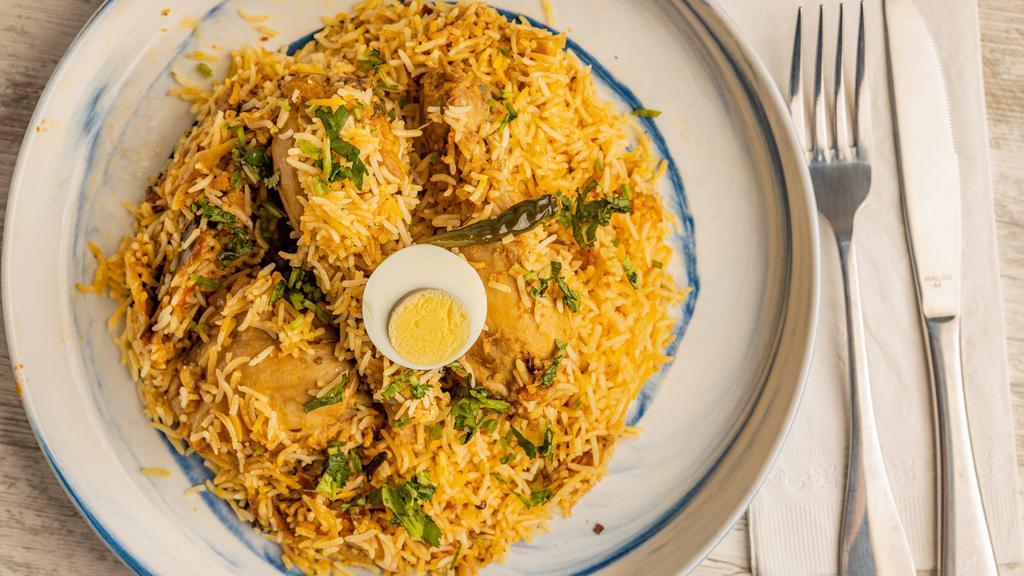 Chicken Biryani · Chicken biryani is a savory chicken and rice dish that includes layers of chicken, rice, and aromatics that are steamed together.