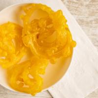 Jalebi · Indian desserts made by deep-frying a wheat flour, batter in pretzel or circular shapes, whi...