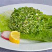 Tabouleh · Vegan. Finely chopped parsley, tomato, bulgur, and onions. Seasoned with salt, lemon juice a...
