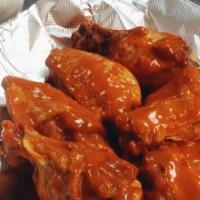 Chicken Wings · Gluten free. Jumbo naked chicken wings deep fried and made to order with your choice of buff...