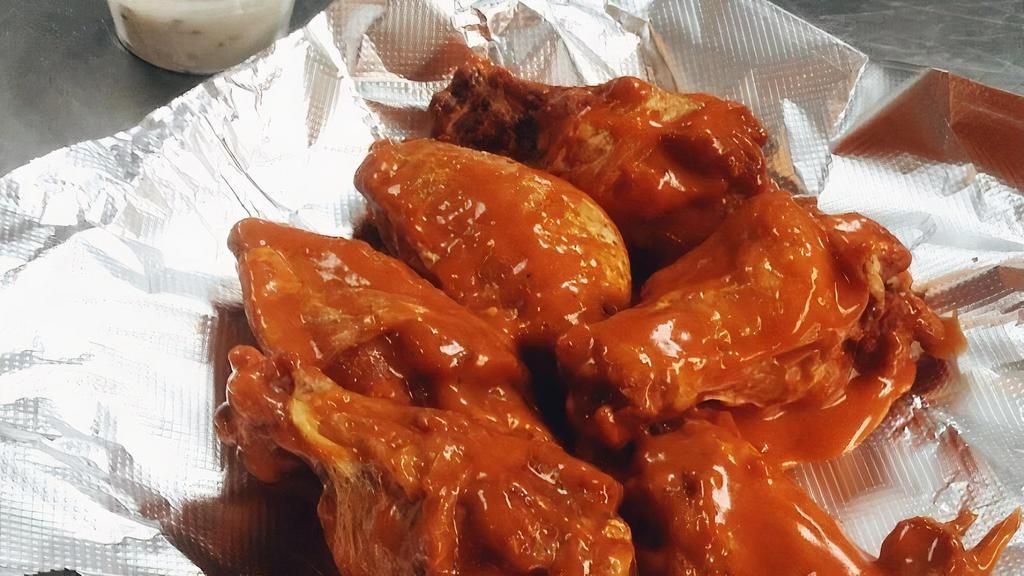 Chicken Wings · Gluten free. Jumbo naked chicken wings deep fried and made to order with your choice of buffalo, sweet chili, chipotle BBQ, Bourbon BBQ or Jerk sauce.