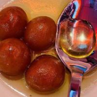 Gulab Jamun · Juice fried cheese balls dipped in honey syrup.