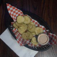 Fried Pickles · Crinkle cut kosher pickle slices hand battered and fried golden brown.  Served with our home...