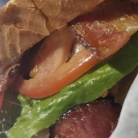 Blt · 4 pieces of thick cut apple wood smoked bacon with fresh lettuce and tomato.  Served on gril...