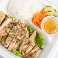Chargrilled Chicken · Served with cucumber, pickle carrots, cilantro and a side of steam rice.