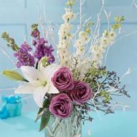 Burst Of Light Bouquet Bouquet · A traditional appeal with contemporary flair. White lilies and larkspur are paired with lave...