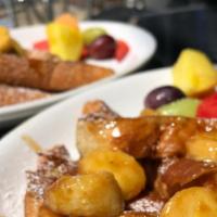 Bananas Foster French Toast · A rich, puffy crust filled with the fresh taste of our signature homemade Bananas Foster sau...