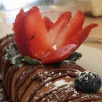 Crepe · Fresh strawberries, sliced bananas, and blueberries topped with Nutella sauce, wrapped in a ...
