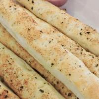 Breadsticks · Baked and served with marinara sauce.
