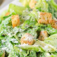 Caesar · Romaine lettuce, croutons, and parmesan cheese