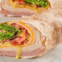 Club · VIP ham, fresh oven-roasted turkey breast, tomatoes, lettuce, and cheddar cheese
