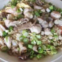Combination Fried Rice (Com Thap Cam) · Shrimp, pork, and chicken.