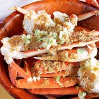 Snow Crab Legs · Per pound and seasoned in garlic butter sauce.