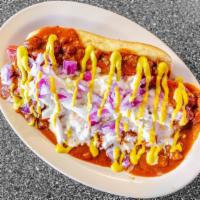 Buster Dog · A quarter pound all beef hot dog, smothered in home made chili, slaw, yellow mustard, and di...