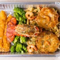 Seafood Disaster · Southern fried catfish, steamed broccoli, Maine  stuffed lobster tail, seafood whodat pasta,...