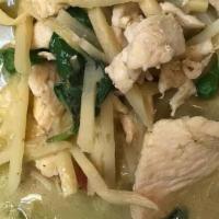 L Green Curry · (SPICY) Traditional style green curry in coconut milk, bamboo shoot, green peas bell pepper ...