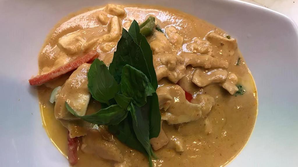 L Pumpkin Curry · (SPICY) Red curry in coconut milk with pumpkin, bell pepper and fresh basil leave
