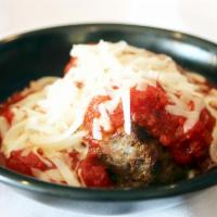 Meatballs · Two large Italian Meatballs smothered in Marinara, topped with Mozzarella cheese, and garnis...