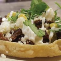 Sopes · A small bowl of homemade corn tortilla; with beans, your choice of fajita chicken, steak, ca...