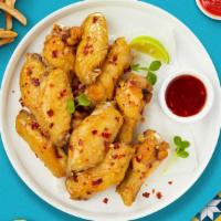 Red Hot Sweet Chili Tenders · Chicken tenders breaded, fried until golden brown before being tossed in sweet chili sauce. ...