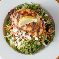 Blackened Salmon Salad · Mixed greens tossed in raspberry vinaigrette with pine nuts, carrots, dried cranberries, wal...