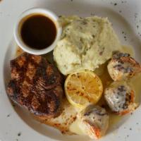 Surf And Turf · Tender 5oz char-grilled filet, lightly seasoned and served with three stuffed jumbo shrimp a...