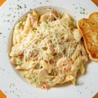 Jambalaya Pasta · Our most popular pasta dish! Shrimp, chicken, and andouille sausage sautéed with onions, tom...