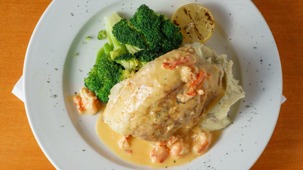 Nantucket Island Stuffed Tilapia · Fresh Tilapia stuffed with lump crab meat and baked to perfection, served with mashed potatoes, sautéed broccoli and garnished with lobster cream sauce