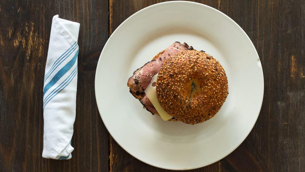 Reuben · Hot pastrami or turkey with swiss, coleslaw, and russian dressing on a everything bagel.