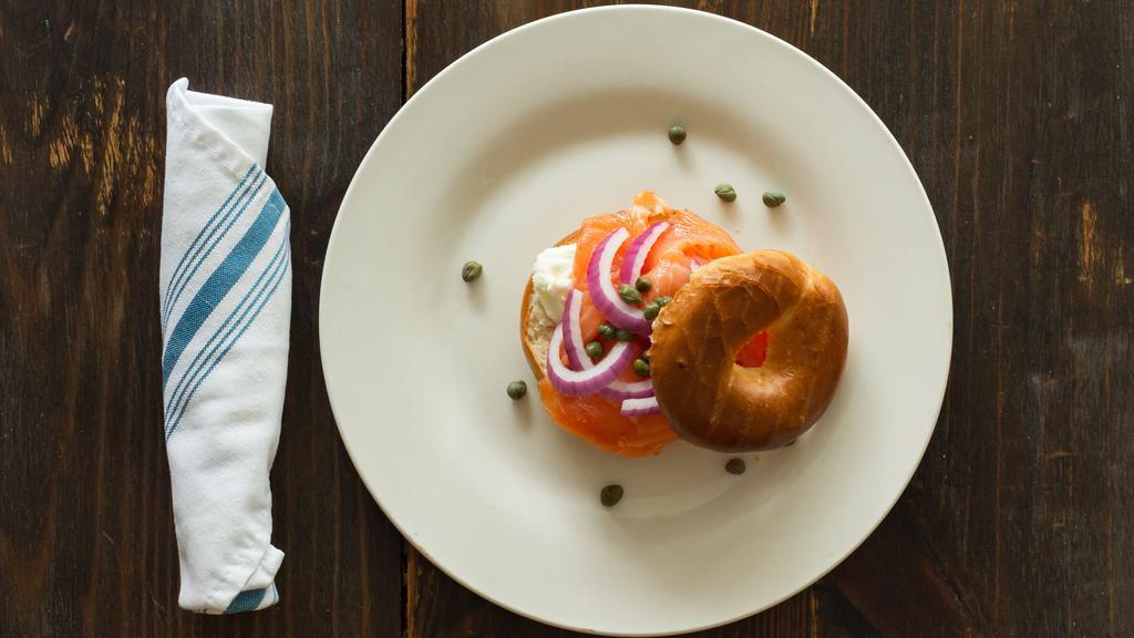 Henry Anthony · Smoked salmon on a toasted bagel with cream cheese, red onions, and capers.