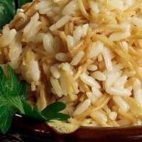 Mediterannean Rice · long grain rice and vermicelli cooked in a vegetable broth. (Vegan)