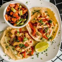 Tacos Da Lapa · Gluten free. Maria's delicious hand-made tortillas, sizzling chicken breast strips, red onio...