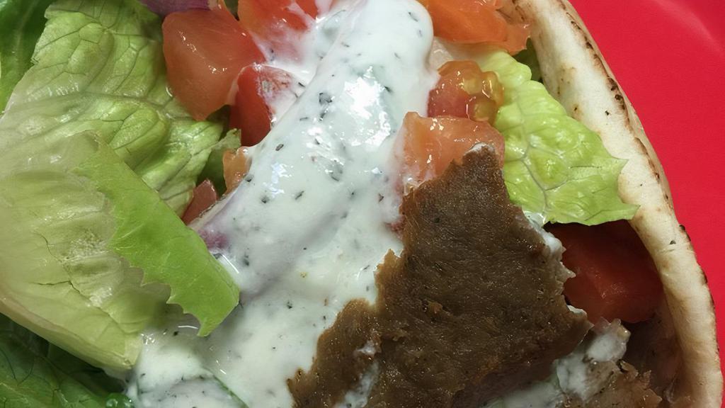 Original Gyro · Gyro meat, lettuce, tomatoes, purple onions and cucumber sauce.