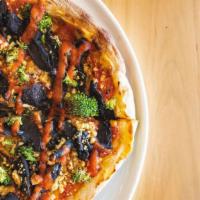 Smokey Mushroom Pizza · Whole grain pizza crust, tomato sauce, cashew cheese, broccoli, mushrooms, red pepper jalape...