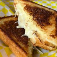 Grilled Cheese · 3 slices of texas toast stuffed with american cheese
try it with pimento cheese for 1.50 extra