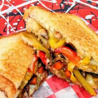 Fire Breathing Veggie · 3 slices of texas toast, stuffed with pepper jack cheese, sautéed mushrooms, grilled onions,...