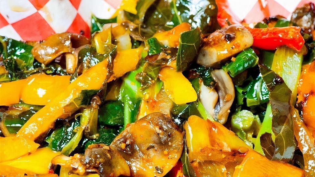 Stir Fry Collard Greens · Fresh collard greens stir fried with mushrooms, Vidalia onions, sweet peppers, and banana peppers