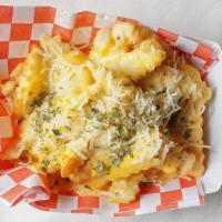 Cheesy Cheese Fries · Your choice of fries topped with white queso and shredded monterey jack cheese