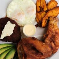 Típico Con Pollo · Try our delicious fried chicken served with refried beans, eggs, sweet plantains, avocados, ...