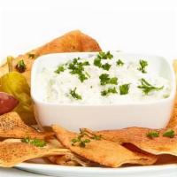 Taziki Dip · Cucumber, dill, and lemon. Served with soft or baked pita chips.