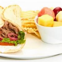 Grilled Beef Tender Gyro · Sauce, tomatoes, mixed lettuce, and grilled onions. Served with chips and choice of a side.